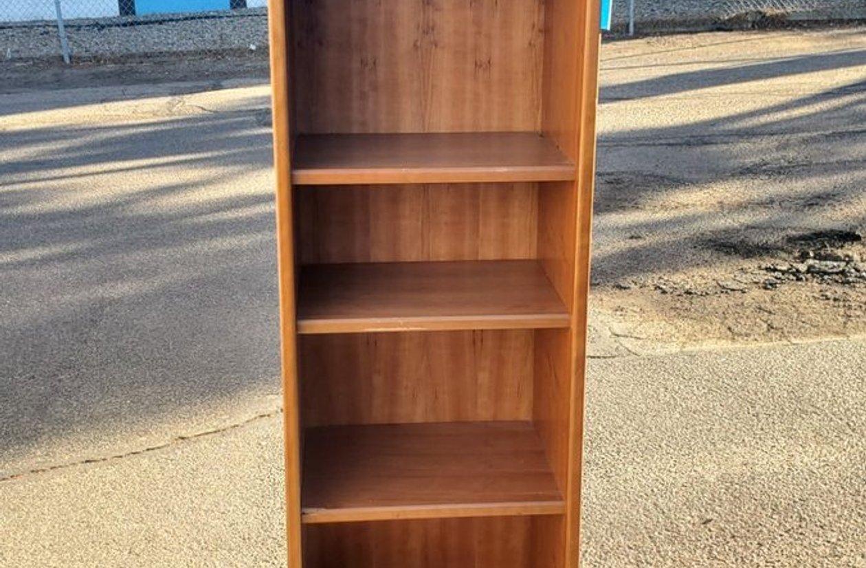 Tall slim 5-shelf bookcase in honey wood tone